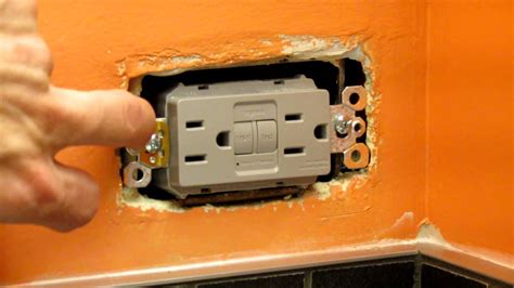 how to fix loose electrical box in wall|how to tighten electrical outlet.